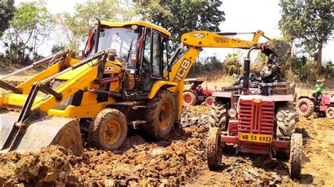 New Jcb Dx Machine Loading Mud In Sonalika And Mahindra Tractor For