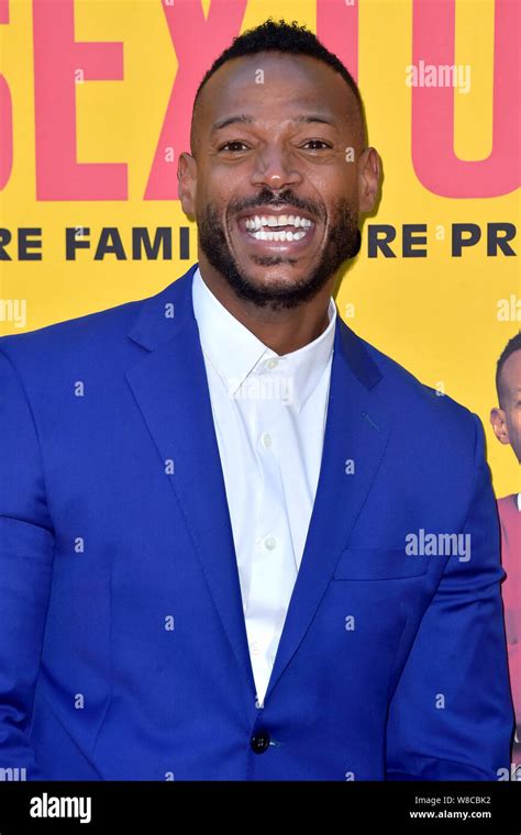 Marlon wayans sextuplets hi-res stock photography and images - Alamy