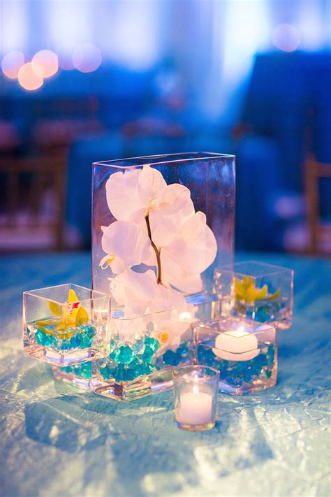 Modern Orchid and Blue Bead Centerpieces