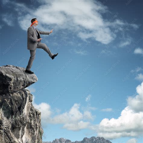 Stepping Off A Cliff Ledge Stock Photo Adobe Stock