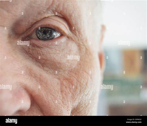 Old man with new eyes Stock Photo - Alamy