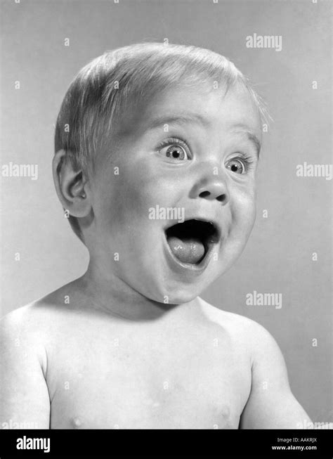 1960s Portrait Baby With Eyes And Mouth Wide Open Stock Photo Alamy