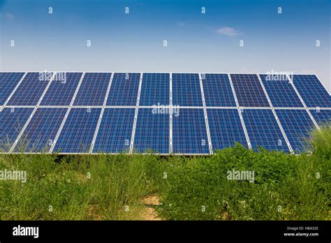 Solar Panels Under Blue Sky Stock Photo Alamy