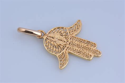 Pendentif main de Fatma en or Jaune 18 carats 750 millièmes en