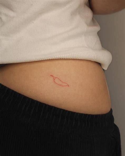 Minimalistic Red Chili Pepper Tattoo Located On The