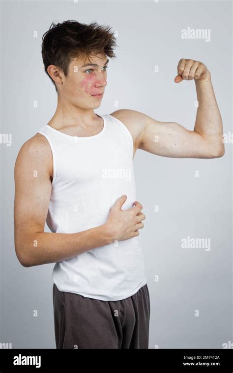 Teenage Boy Flexing Arm Muscle Hi Res Stock Photography And Images Alamy