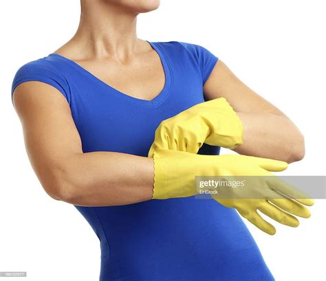 Woman With Yellow Rubber Gloves Isolated On White Background High Res