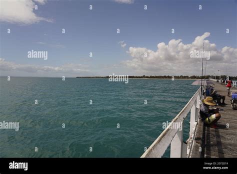 Fishing At Urangan Pier Hervey Bay Queensland Australia Stock Photo