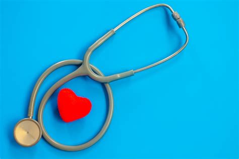 Premium Photo Stethoscope And Red Heart Top View