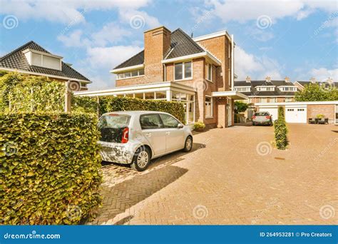 A Car Parked in Front of a House Stock Image - Image of tree ...