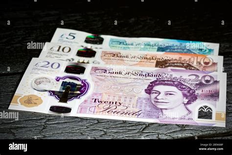 Pound notes polymer twenty hi-res stock photography and images - Alamy