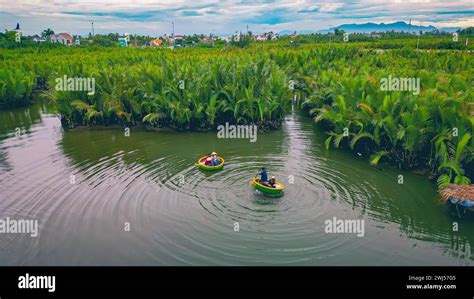 Aerial View Tourists Are Relax And Experiencing A Basket Boat Tour At