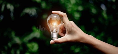 Hand Holding Light Bulb Natural Energy And Love The World Concept