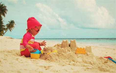 Cute Little Girl Playing With Sand On Beach Stock Image Image Of Girl