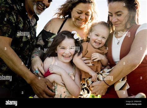 Mom Daughters Aunt And Uncle Smiling And Laughing In San Diego Stock