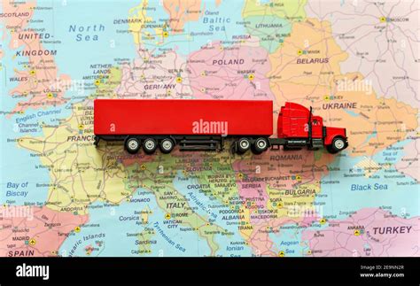 Truck with trailer on the Europe map Stock Photo - Alamy