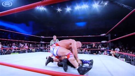 Kurt Angle Locks A Double Ankle Lock On Mr Anderson And Jeff Hardy