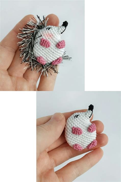 There Is A Hand Holding A Small Crocheted Hedgehog Ornament In It S Palm