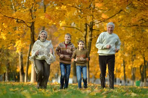 Older man and woman with grandchildren | Stock image | Colourbox