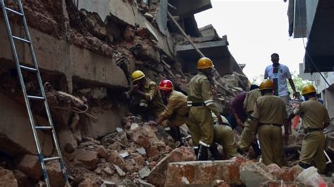 India Building Collapse Kills At Least 14 World CBC News