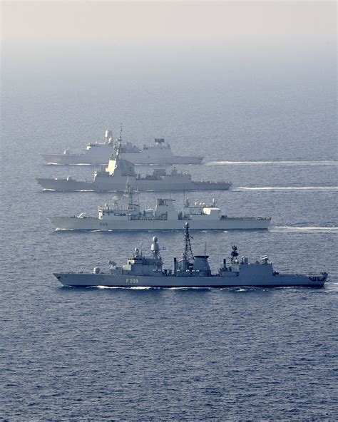 NATO ships conduct manoeuvres at sea (top-bottom) HNMLS De Ruyter, ESPS ...