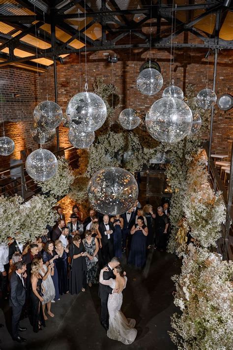 First Dance Under Disco Balls Baby S Breath Dance Floor Wedding