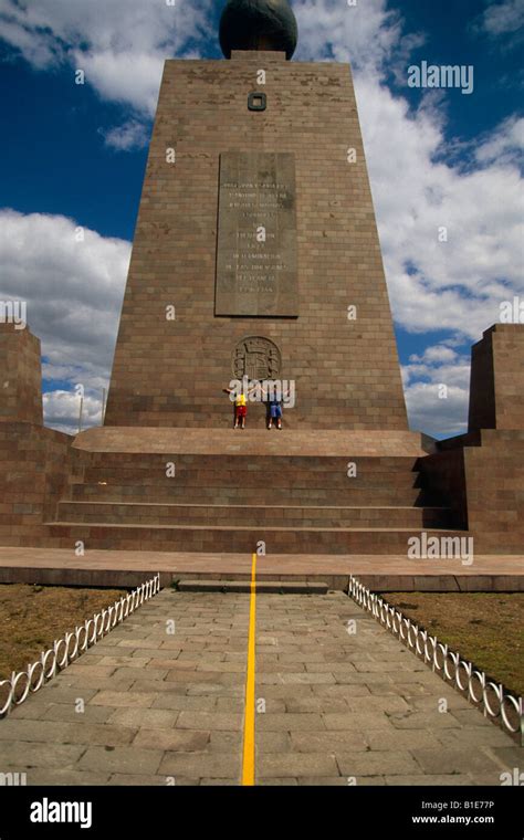 people posing  equator monument ecuador stock photo alamy