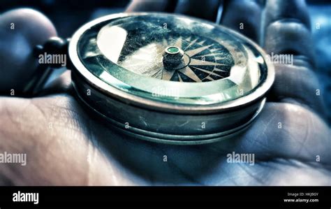 Navigating With A Compass In Hand Stock Photo Alamy