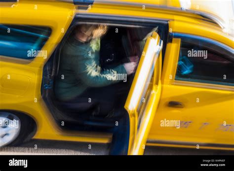 Taxi Passengers Coming Out Stock Photo Alamy