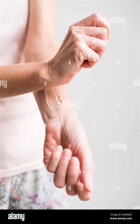 Woman Applying Estrogen Gel On Hi Res Stock Photography And Images Alamy