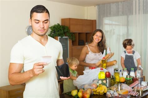 Free Photo | Poor family with bags of food