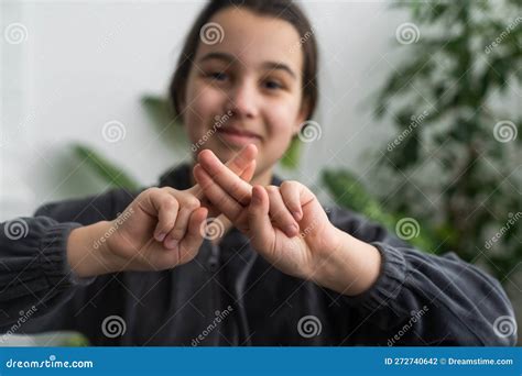 Beautiful Smiling Deaf Girl Using Sign Language. Stock Photo - Image of ...