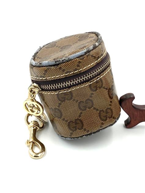 Gucci Keychain and coin purse on Carousell