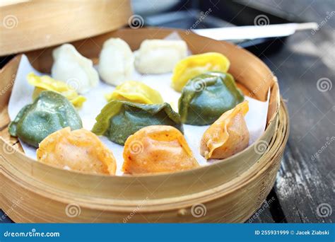 Traditional Chinese Dumplings In A Bamboo Steamer Basket Close Up