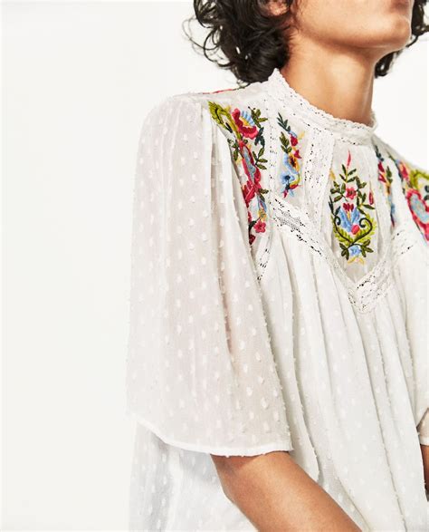 DOTTED MESH BLOUSE WITH FLORAL EMBROIDERY View All TOPS WOMAN ZARA