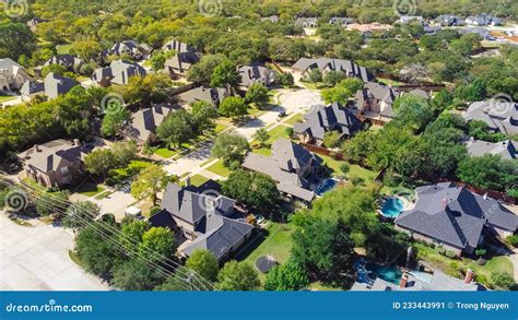 Aerial View Upscale Neighborhood With Expensive Houses Near Service