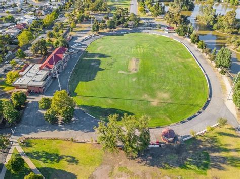 Image Of Aerial View Of A Road Surrounding A Football Oval And