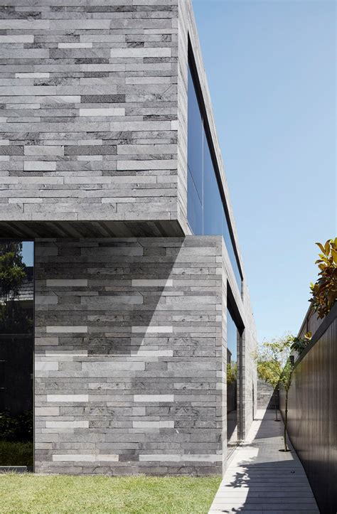 A Residence Clad In Rough Lava Stone Stone Cladding Exterior Stone