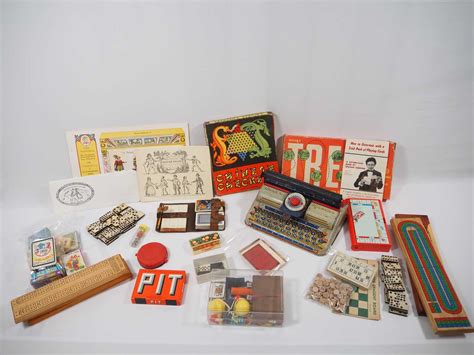 Lot 365 - A collection of vintage toys to include