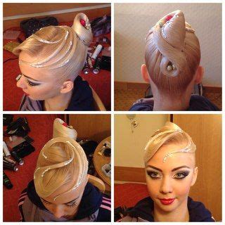 High Knotted Bun With A Clean Bang Swoop And Wisps Good Hairstyle Or