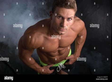 Handsome Shirtless Bodybuilder Shot From Above Standing Stock Photo