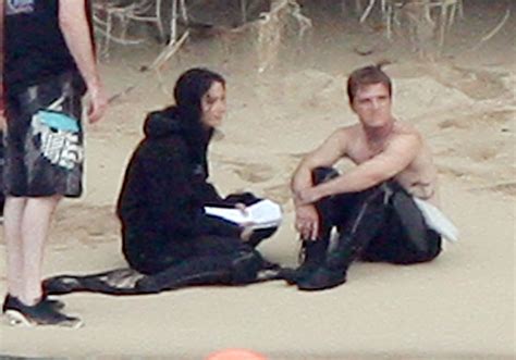 Jennifer Lawrence & Shirtless Josh Hutcherson: 'Catching Fire' Sea ...