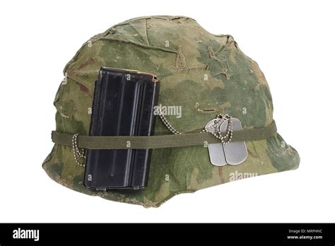 US Army helmet Vietnam war period with camouflage cover, magazine with ...