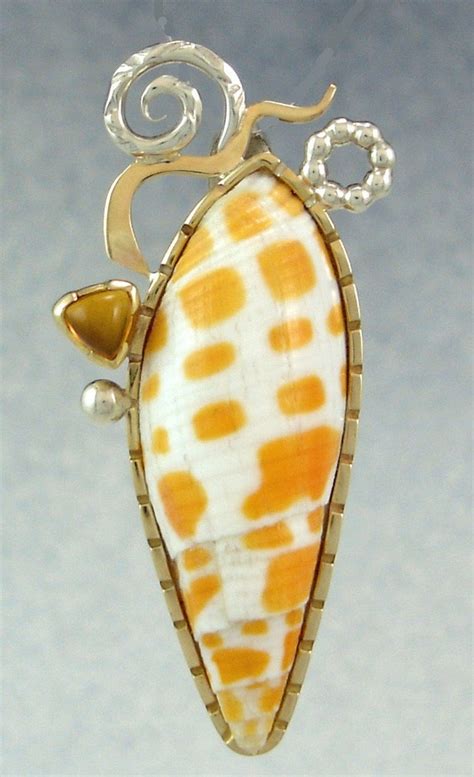 Items similar to junonia shell pendant- natural sea shell on Etsy