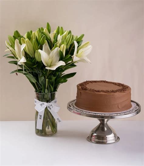 Chocolate Fudge Cake Lilies Bundle By Sugar Daddy S Bakery In Amman