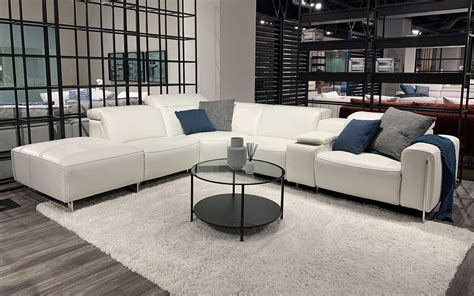 VOYAGE MODERN LEATHER SECTIONAL WITH OTTOMAN | Leather reclining sectional, Leather sectional ...