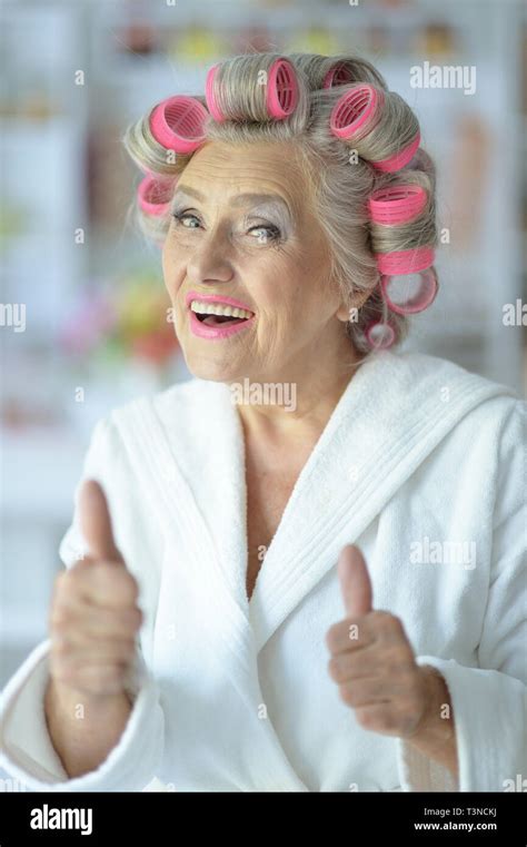 Mature Woman In Pink Bathrobe Hi Res Stock Photography And Images Alamy