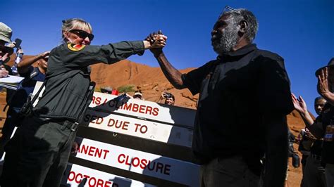 Celebrations and tears from traditional owners as Uluru climb ban ...