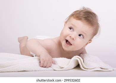 Naked Smiling Baby Looking Camera Bed Foto De Stock