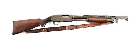 At Auction C STEVENS MODEL 620 SLIDE ACTION TRENCH SHOTGUN